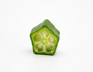 single pieces of okra close up isolated on the white background - obrazy, fototapety, plakaty