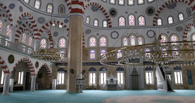 Accra Ghana National Mosque inside Muslim Islam pan. Open in 2021. Replica of the Blue Mosque or Sultan Ahmed Mosque in Istanbul Turkey. Prayer reading the Quran or Koran. Islam religion.