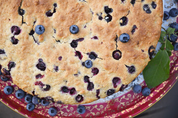 Large freshly baked homemade blueberry pie, summer food, close up