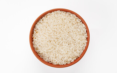 Fototapeta na wymiar Long polished rice in bowls and bags isolated on a white background. High quality photo