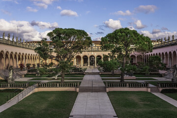 Perspective shot of a Ringling Museum with an inner yard in Florida.