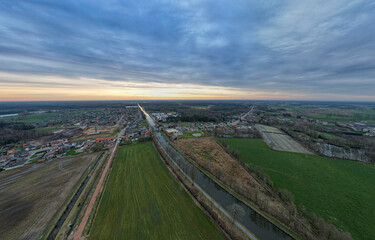 canal Dessel Schoten aerial photo in Rijkevorsel, kempen, Belgium, showing the waterway in the natural green agricultural landscape. High quality photo. High quality photo