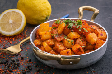 Closeup shot of TRADITIONAL SYRIAN food, cooked potatoes with lemon