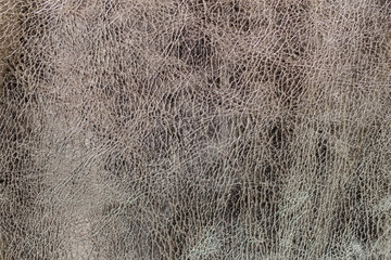 Texture of genuine leather close-up, fashion deep grey color. For modern pattern, wallpaper or banner design