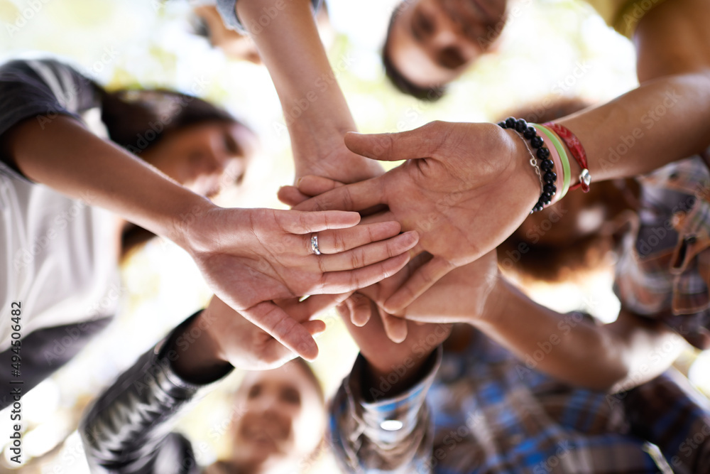 Poster three cheers for summer. a group of friends standing in a huddle with their hands piled.