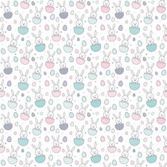 Colourful Easter pattern with bunnies and eggs. Vector.