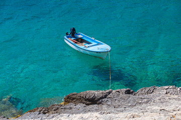 Boat tied to coast, Vis island, Croatia