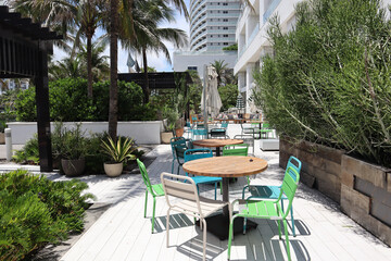 View of seats on a patio at a restaurant in Miami, Florida, USA