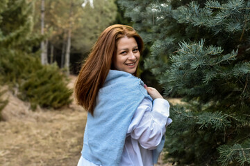 Naklejka premium portrait of a woman in a forest