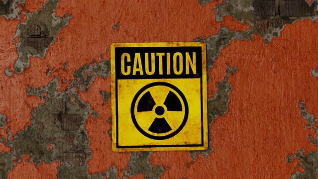 Radioactivity sign - caution, on an orange painted peeling brick wall