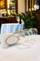 glasses on empty restaurant table in contemporary restaurant