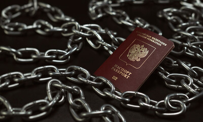 the passport of the Russian Federation against the background of chains as a symbol of restrictions...