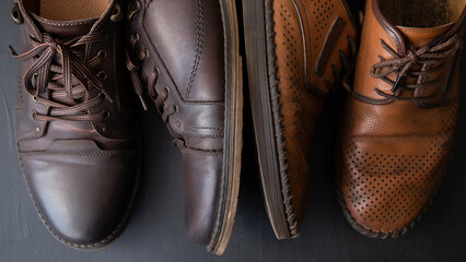 Men's shoes on a black background. Style and fashion.