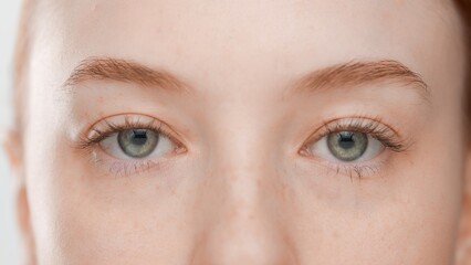 Extreme close-up portrait of young Caucasian woman | Eye bags removal concept