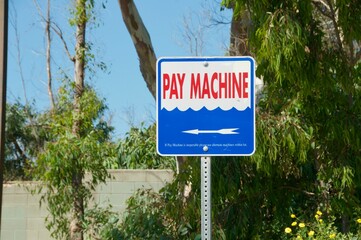 Fototapeta premium Pay Machine sign in parking lot of Nichols Canyon Malibu California