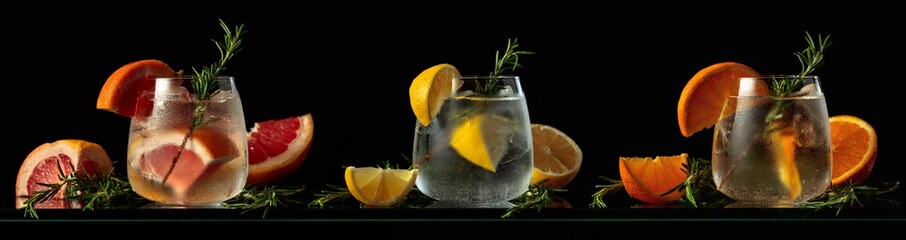 Gin tonc cocktails with grapefruit, lemon, and orange.