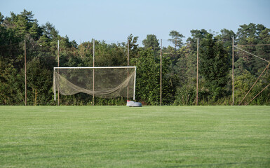 a soccer field with a robotic lawn mower