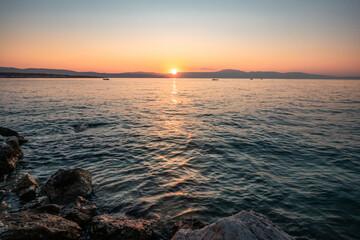 Landscape in the sunset, view of the sea in Baska Bay. seascape waves and beach