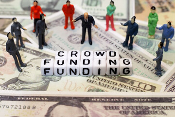 crowd of people and letter cube on dollar background. conceptual image of crowd funding for start-up business, raised fund or donation.