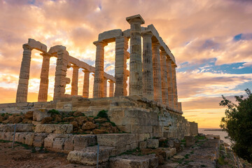 The Temple of Poseidon at Cape Sounion at sunset, over the Aegean Sea, Greece