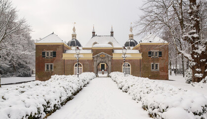 Red brick Endegeest castle in winter, Netherlands