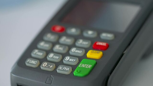 Woman paying with contactless credit card. Wireless money transaction. Wireless payment