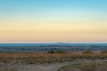 Coastal landscape of Puglia with a view of the Tremiti islands in the background