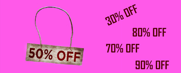Set of tags with different percentage discounts on a pink background. Seasonal sale in shops