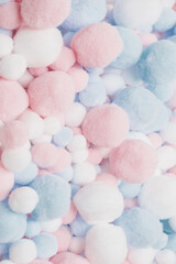 White, pink and blue soft pompons.