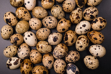 Group of quail eggs as a background. Raw eggs.