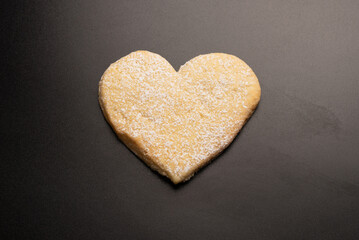 Shortbread in the shape of a heart isolated on white background.