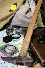 Still life with tools of a field geologist - field vintage geology concept