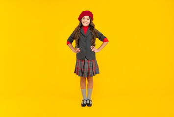 september 1. happy childhood. smart child. happy teen girl in beret full length.