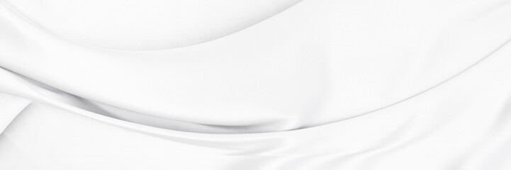 White gray satin texture that is white silver fabric silk background with beautiful soft blur pattern natural.