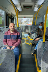 Fototapeta na wymiar ugly man and ugly woman in to the city bus