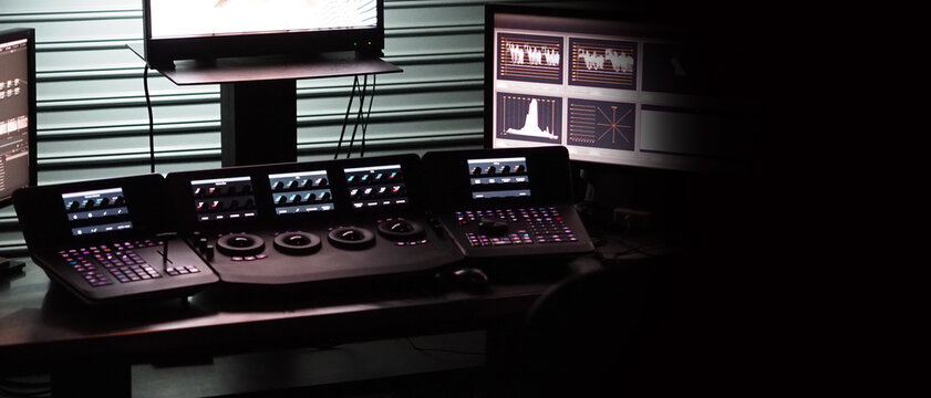 Video editing controller machine for color edit in post video production. Many button control panel for telecine adjust color on digital video movie or film in post production stage. Editor tools.