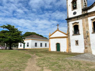 Fototapeta na wymiar The historic church of Santa Rita de Cassia and the old town prision in Paraty, Rio de Janeiro, Brazil.