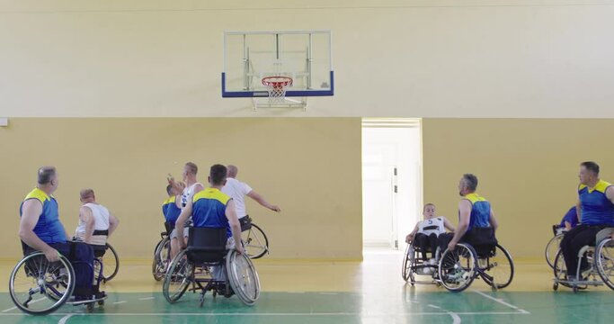 Persons with disabilities play basketball in the modern hall