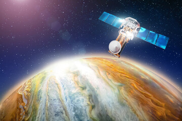 Space satellite orbiting the planet the study of the gas giant, the search for life on another celestial body. Elements of this image furnished by NASA. © aapsky