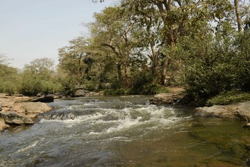 kanger river flowing through the wilderness