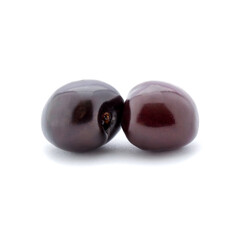 Photo of dark red cherries isolated on white background