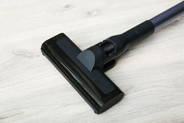Vacuum cleaner on the floor. House cleaning concept. 