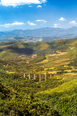 Landscape of the Ouro Preto and Itabirito region, in Minas Gerais, with the ore railway bridge in...