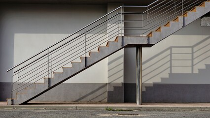 stairs and railing on building facade