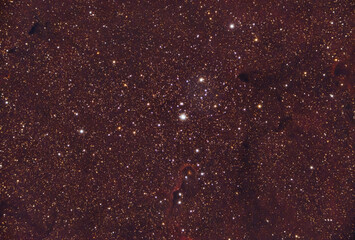 The Elephant's Trunk Nebula  within the much larger ionized gas region IC 1396 located in the constellation Cepheus. Night sky stars chart and background