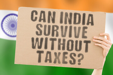 The question " Can India survive without taxes? " on a banner in men's hands with a blurred Honk Kong flag on the background. Rates. Hand. Pay. Wealth. India. Giving. Crisis. Rupee. Return. Increase