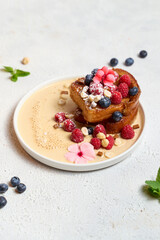 Ring rum baba with lime and basil and raspberries