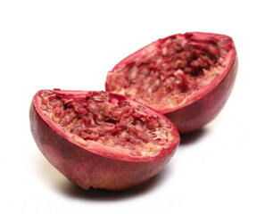 Squeeze pomegranate peel half for juice isolated on white 