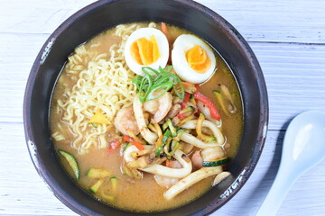 Japanese ramen, miro-based soup, sirloin steak, vegetables, pasta, and egg