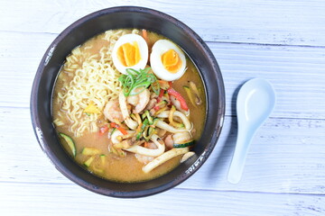 Japanese ramen, miro-based soup, sirloin steak, vegetables, pasta, and egg